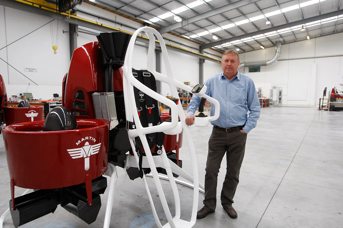 Martin Aircraft CEO Peter Coker stands next to a Martin Jetpack. (Photo: AP)