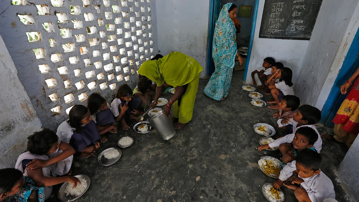 Enrolment in schools on account of the Mid-Day Meal scheme should not be seen as an indicator of the quality of education. (Photo: Reuters)