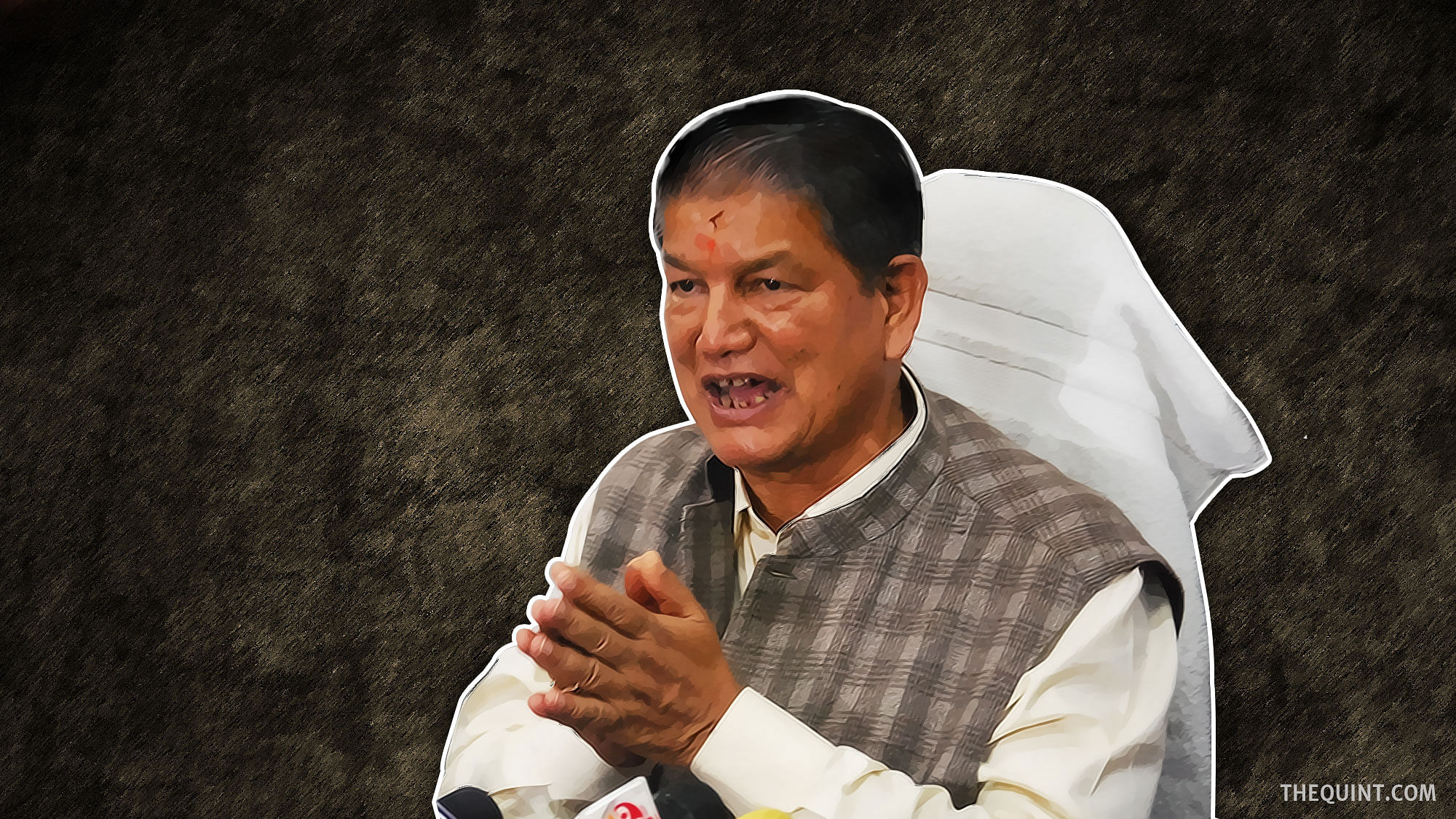 Uttarakhand Chief Minister Harish Rawat addresses a press conference in Dehradun, on 27 March  2016.  (Photo: IANS/ Altered by <b>The Quint</b>)