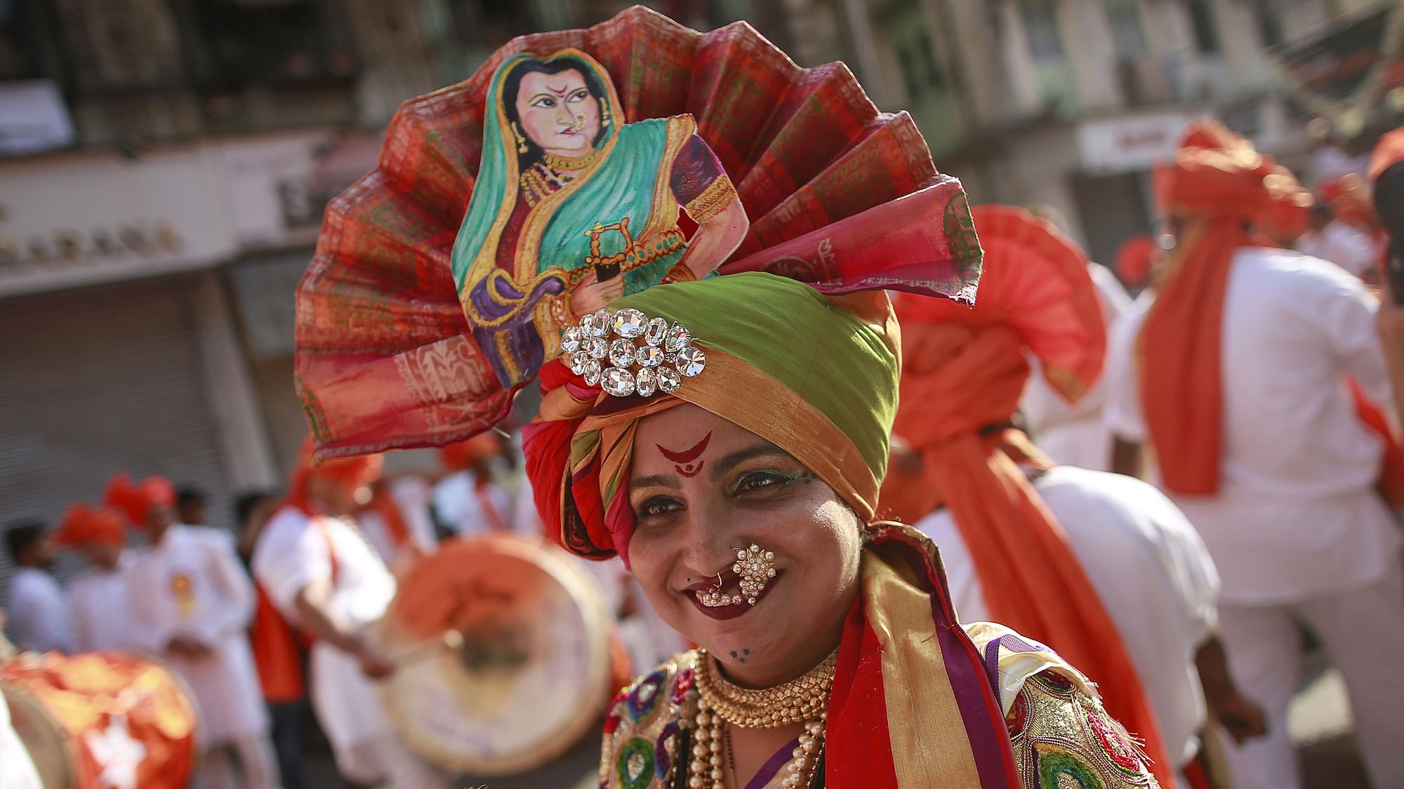 A Maharashtrian woman dressed in traditional costume attends celebrations to mark the Gudi Padwa festival in Mumbai on 8 April 2016.
