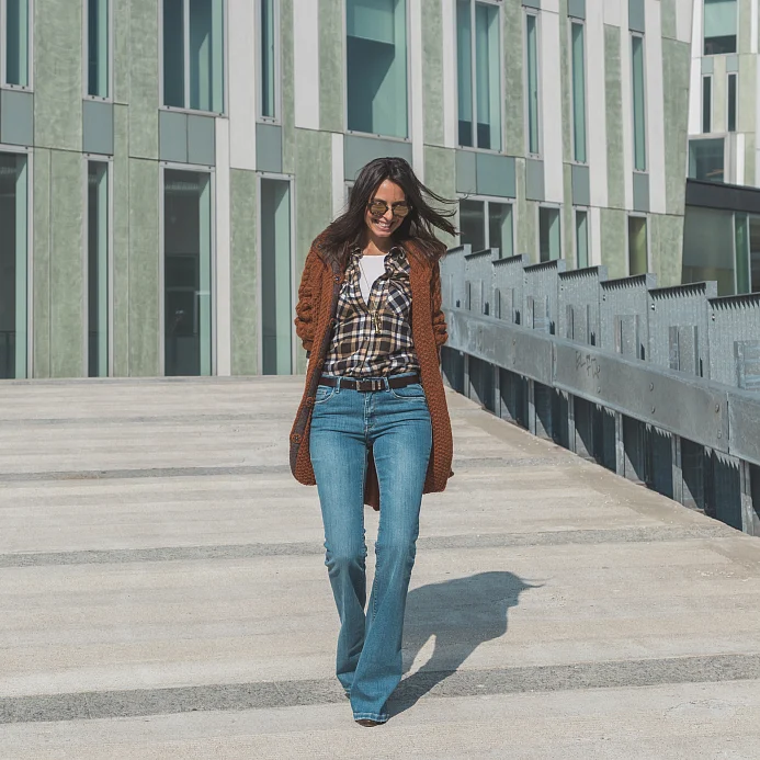Girl posing in a pair of bell-bottoms. (Photo: iStock)