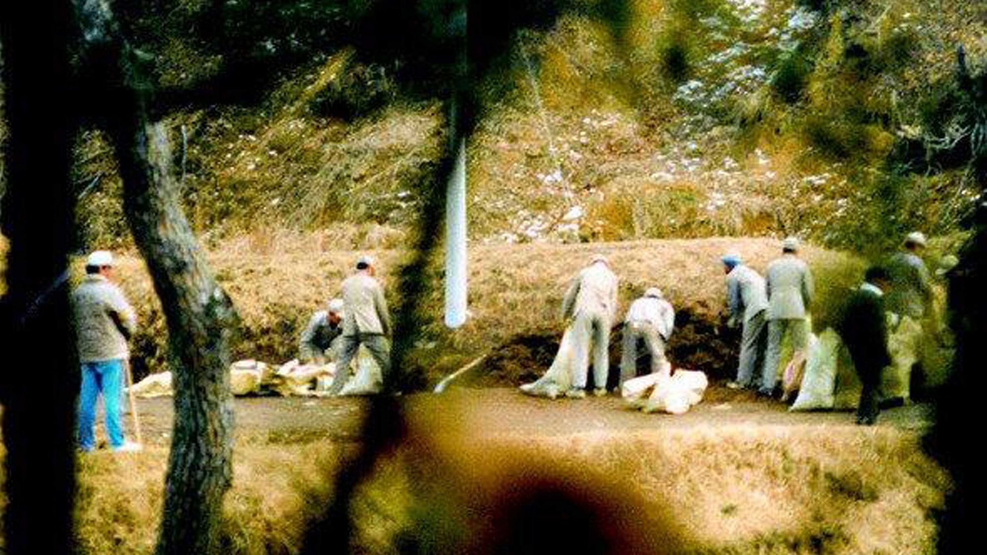 In this December 1986 photo provided by the Ulsan District Prosector’s Office, Brothers Home inmates work at a construction site in Ulsan, South Korea. (Photo: AP)