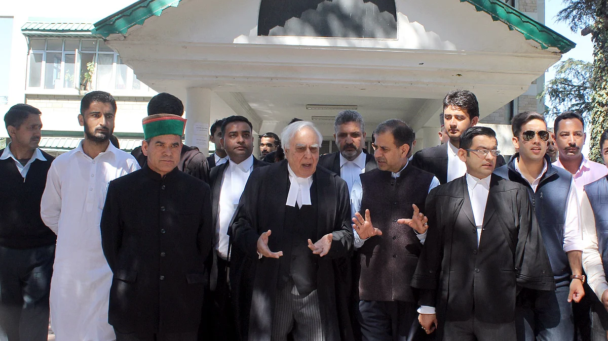 Congress leader and lawyer Kapil Sibal comes out of Himachal Pradesh High Court after pleading for Himachal CM Virbhadra Singh in a disproportionate assets case in Shimla on 1 October 2015. (Photo: IANS)