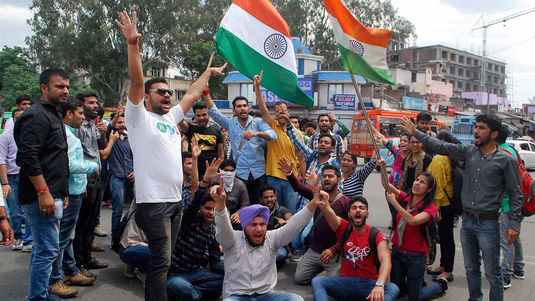 Students of Jammu University holding a protest rally over the NIT Srinagar issue in Jammu on Monday. (Photo: PTI)