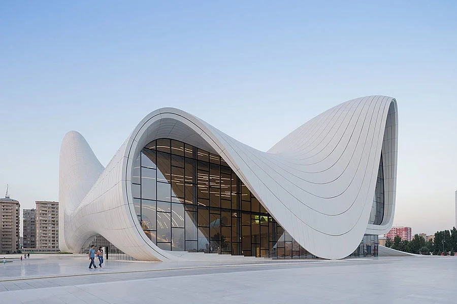 Heydar Aliyev Centre, Baku, Azerbaijan (2011). Stunning curves that leave your eyes wandering at all times. This building won the London Design Museum award in 2014. One judge even called it “as pure and sexy as Marilyn’s blown skirt”. (Photo Courtesy: Zaha Hadid <a href="http://www.zaha-hadid.com/archive">Website</a>)