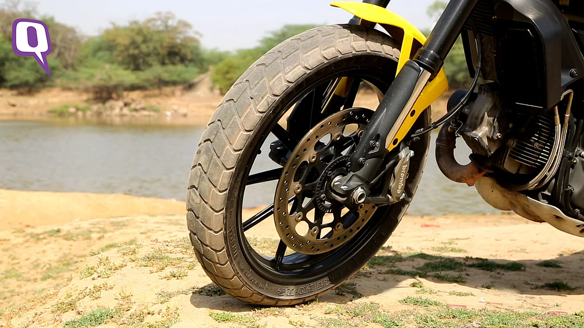 The Brembo brakes come fitted with ABS and have great feedback. (Photo: Siddharth Safaya/<b>The Quint</b>)