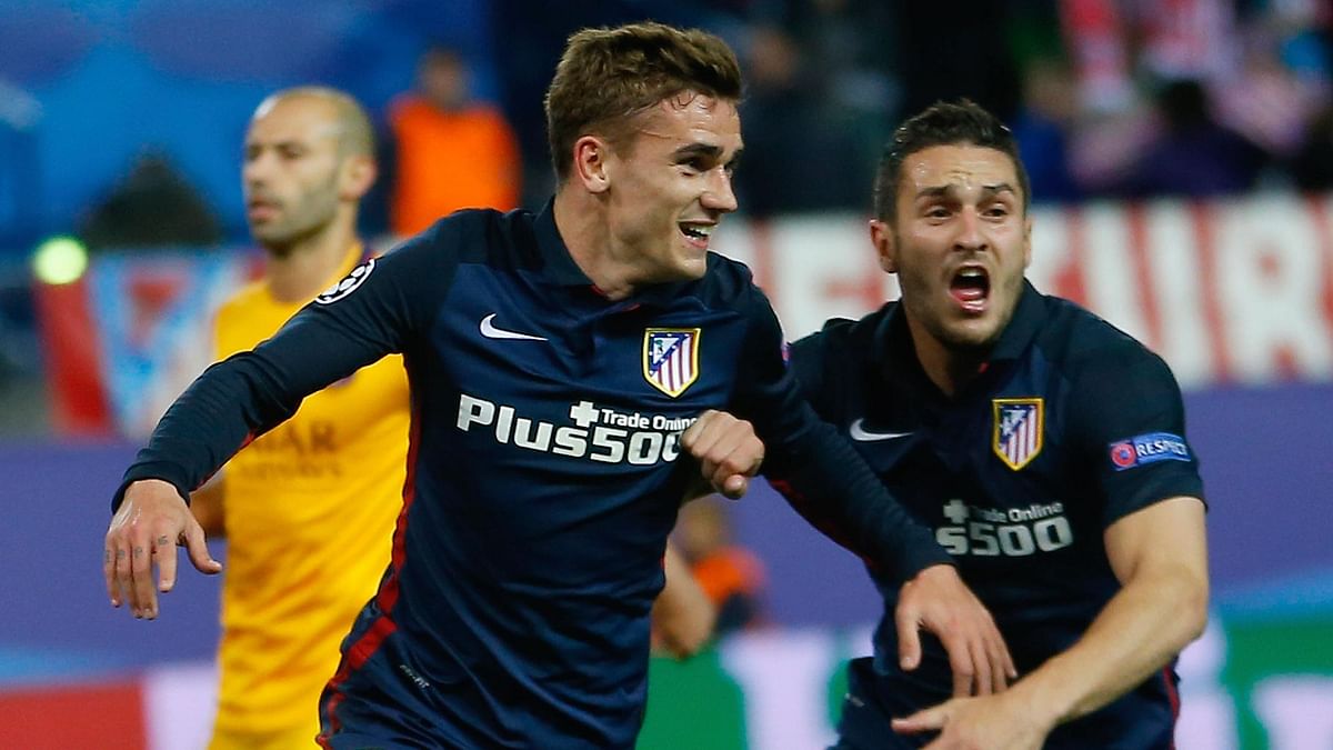 Defending champions Barcelona crashed out of the Champions League after losing to Atletico Madrid.