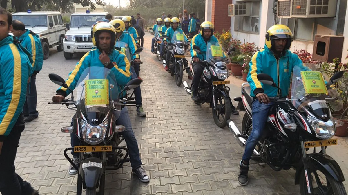 Riders of Bikxie, the bike taxi service.