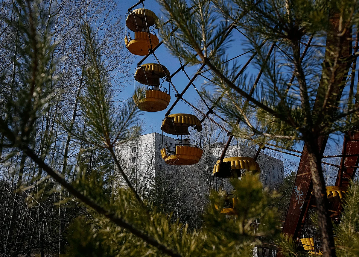 White apartment buildings with modern fittings, tree-boulevards, recreational parks, and the iconic amusement park with the Ferris wheel, all lay in tragic abandon. (Photo: Reuters)