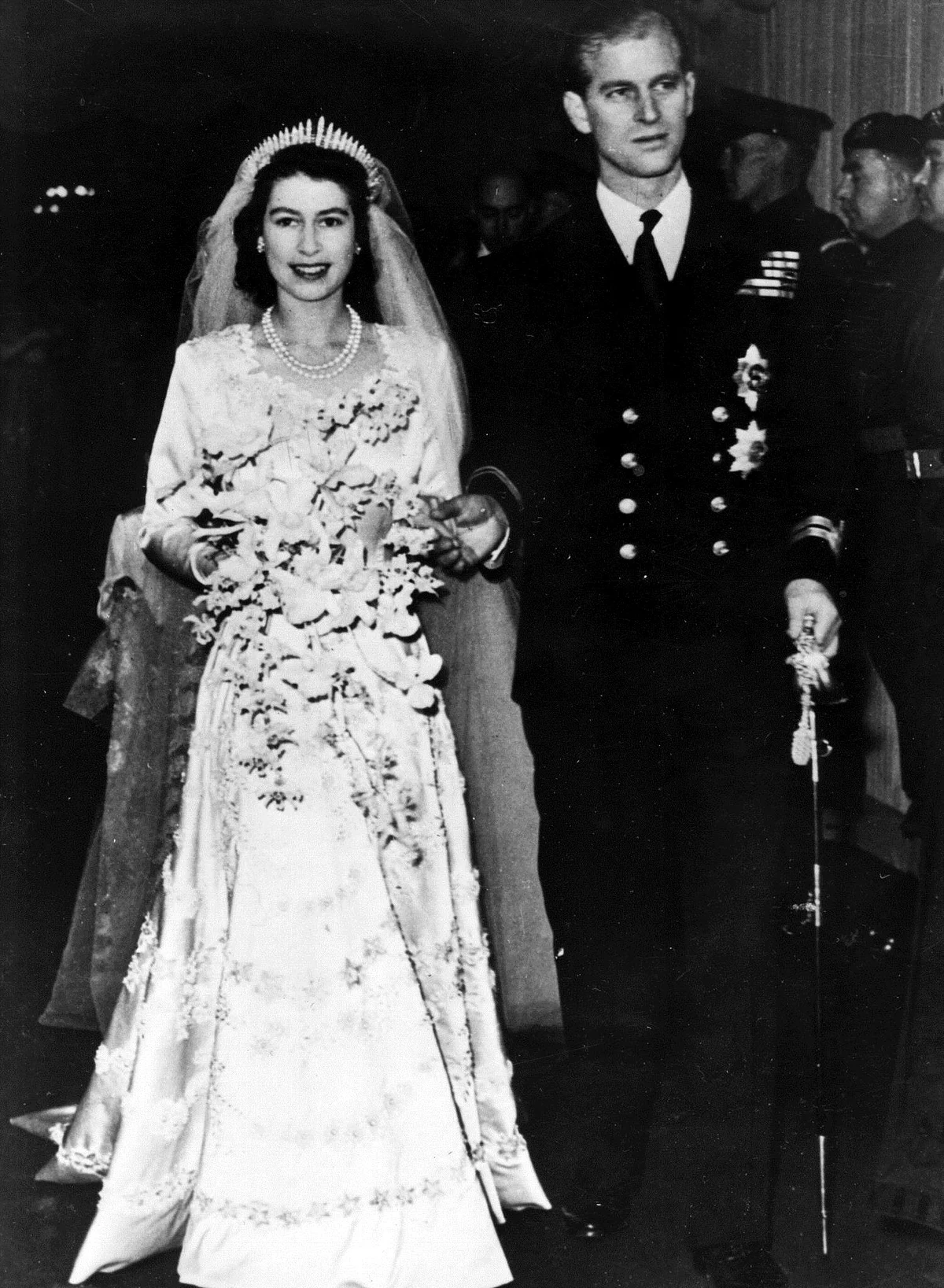 FILE - In this 20 Nov 1947 file photo, Britain’s Princess Elizabeth leaves Westminster Abbey in London, with her husband, the Duke of Edinburgh, after their wedding ceremony. (Photo: AP)