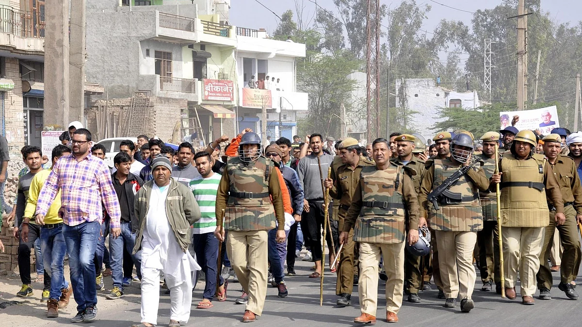 Members of the Jat community block the railway tracks near Pataudi to press for special backward class (SBC) status in Faridabad on February 21, 2016. (Photo: IANS)