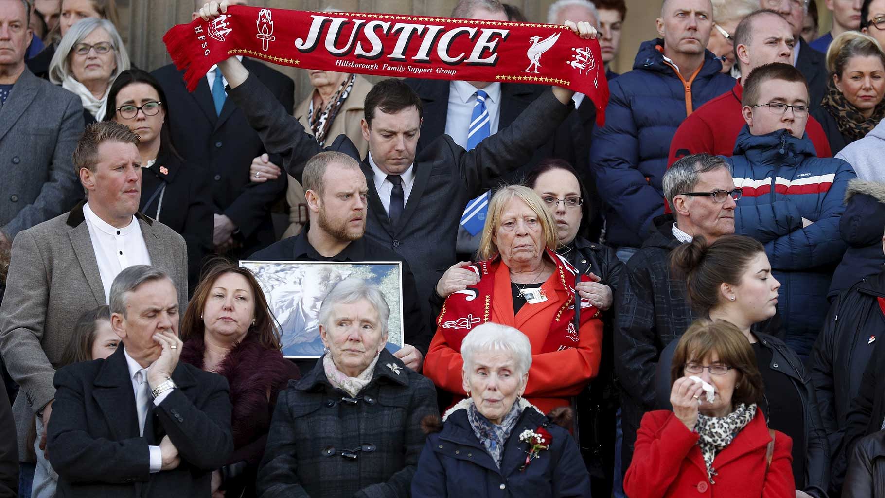 File Photo: Families of the 96 victims react as their names are read out during a vigil in memory of the victims of the Hillsborough disaster at St Georges Hall in Liverpool.