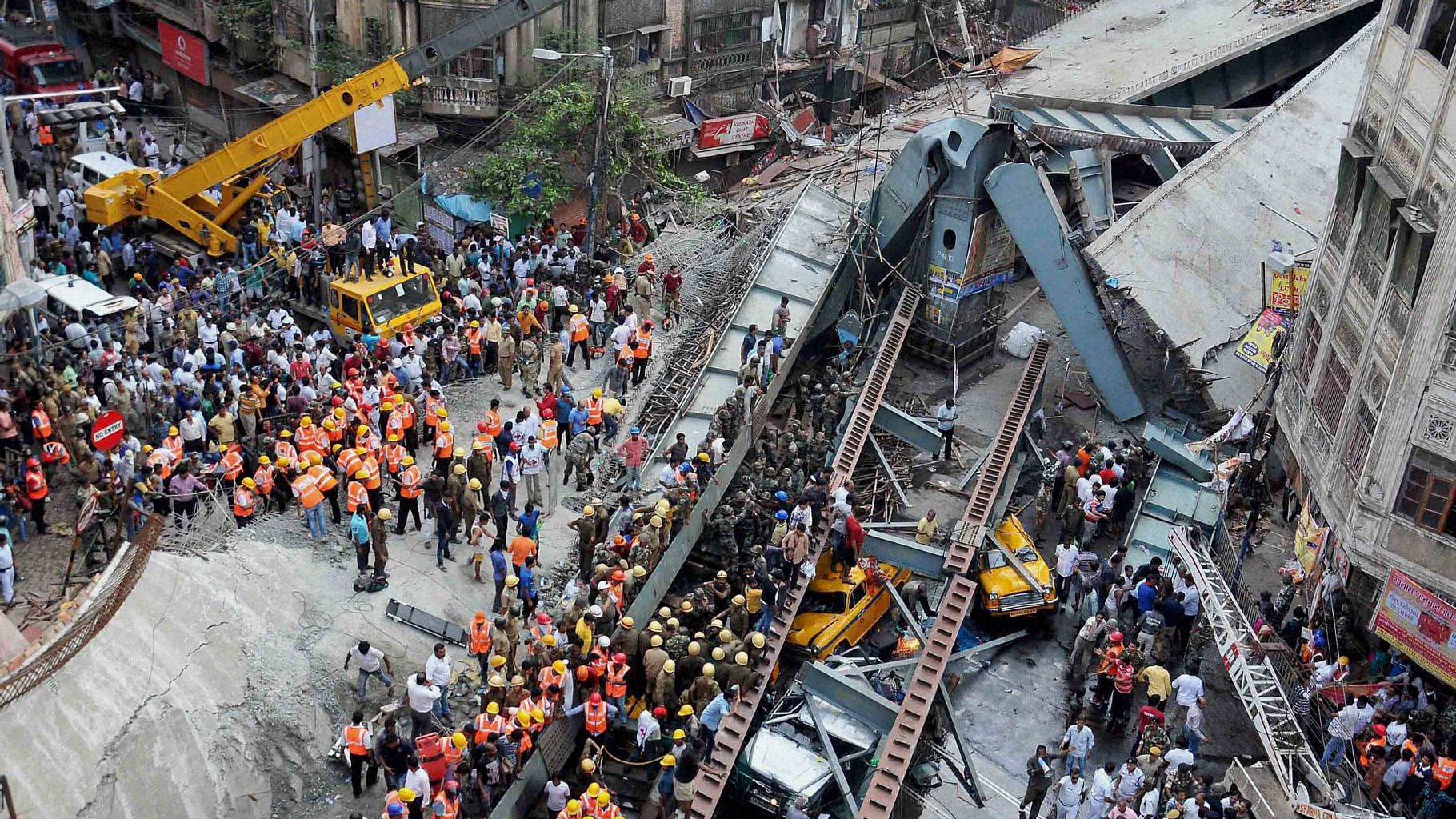 Rescue operations going on after an under-construction flyover collapsed on Vivekananda Road in Kolkata on Thursday. (Photo: PTI)