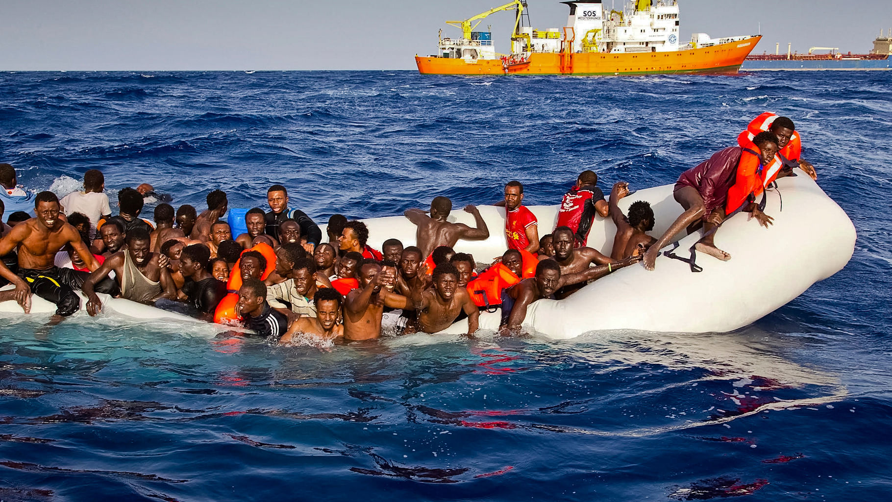 

A group of migrants on their perilous ocean journey. (Photo: AP)