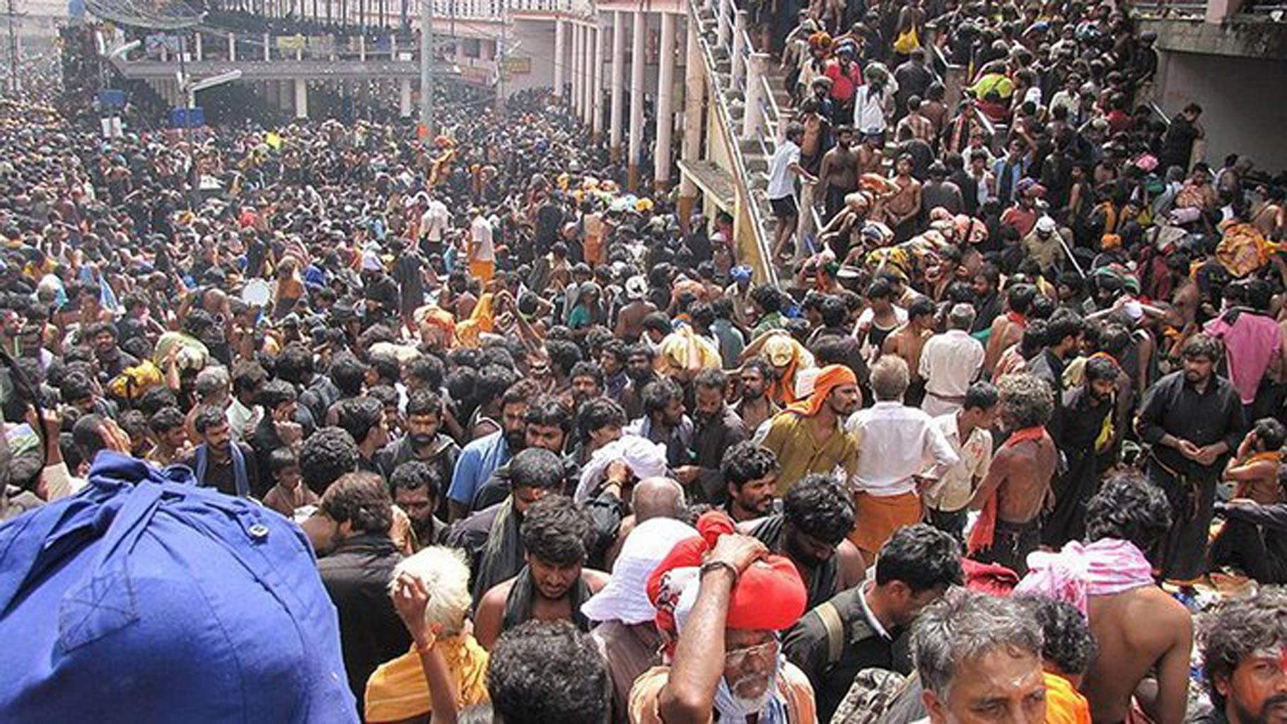 Devotees at Sabarimala temple. (Photo Courtesy: <i>The News Minute</i>)