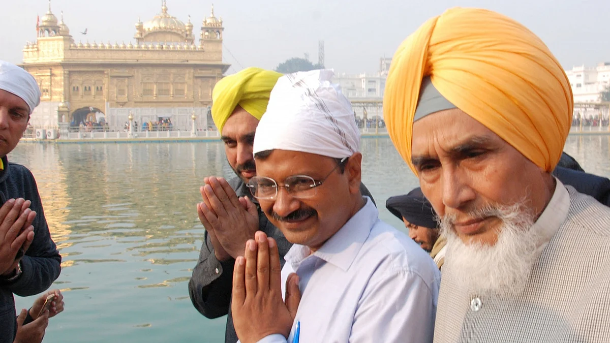 Arvind Kejriwal and AAP MP Bhagwat Mann at the Golden Temple in Amritsar. (Photo: IANS)