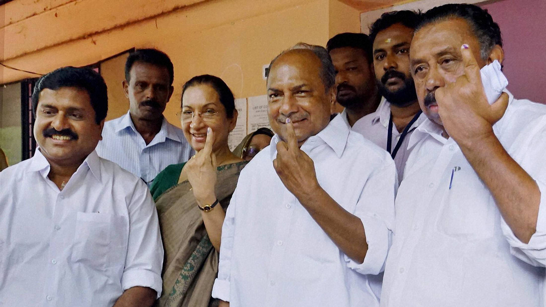  Congress veteran and former Defence Minister AK Antony with his wife Elizabeth Antony and MM Hassan, Vice president of the Kerala Pradesh Congress Committee (KPCC), after casting his vote in Thiruvananthapuram on Monday. (Photo: PTI)&nbsp;