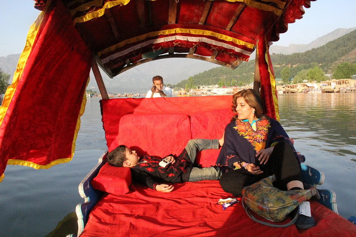 Kazuo in a shikara with mom. (Photo Courtesy: Sahar Zaman) 