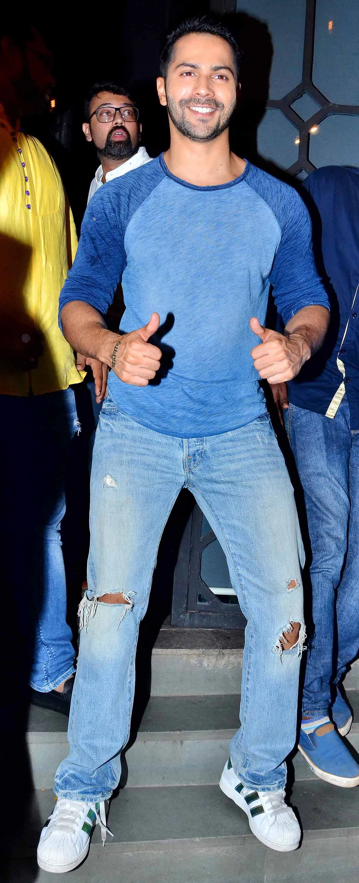 Varun Dhawan strikes a pose while arriving at the party. (Photo: Yogen Shah)