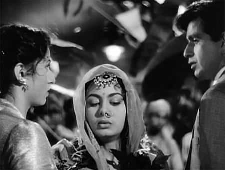 Madhubala, Nimmi and Dilip Kumar in a scene from<i> Amar </i>(1954)