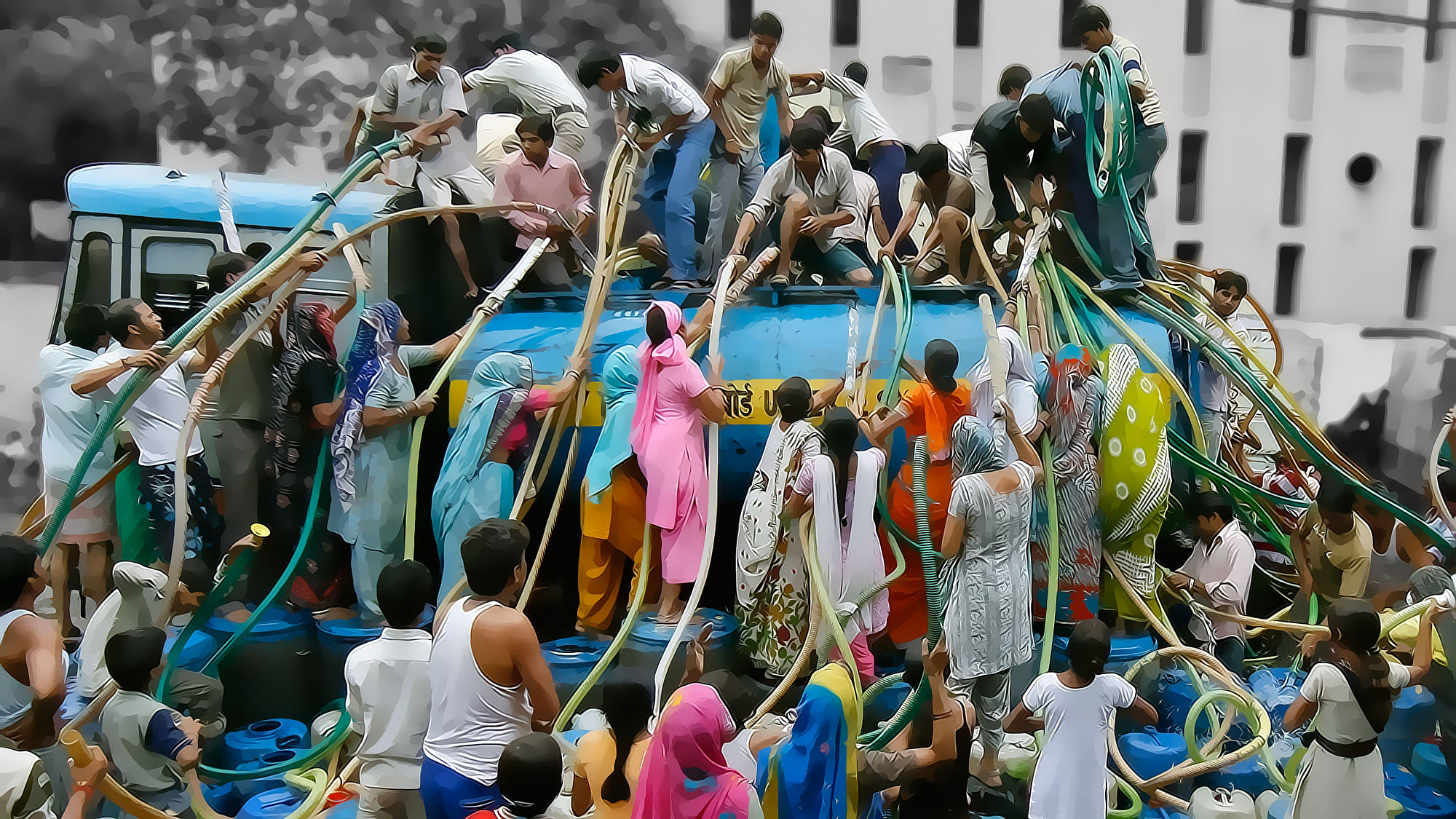 Residents of a Delhi colony crowd around a water tanker provided by Delhi Jal (water) Board to fill their containers. 