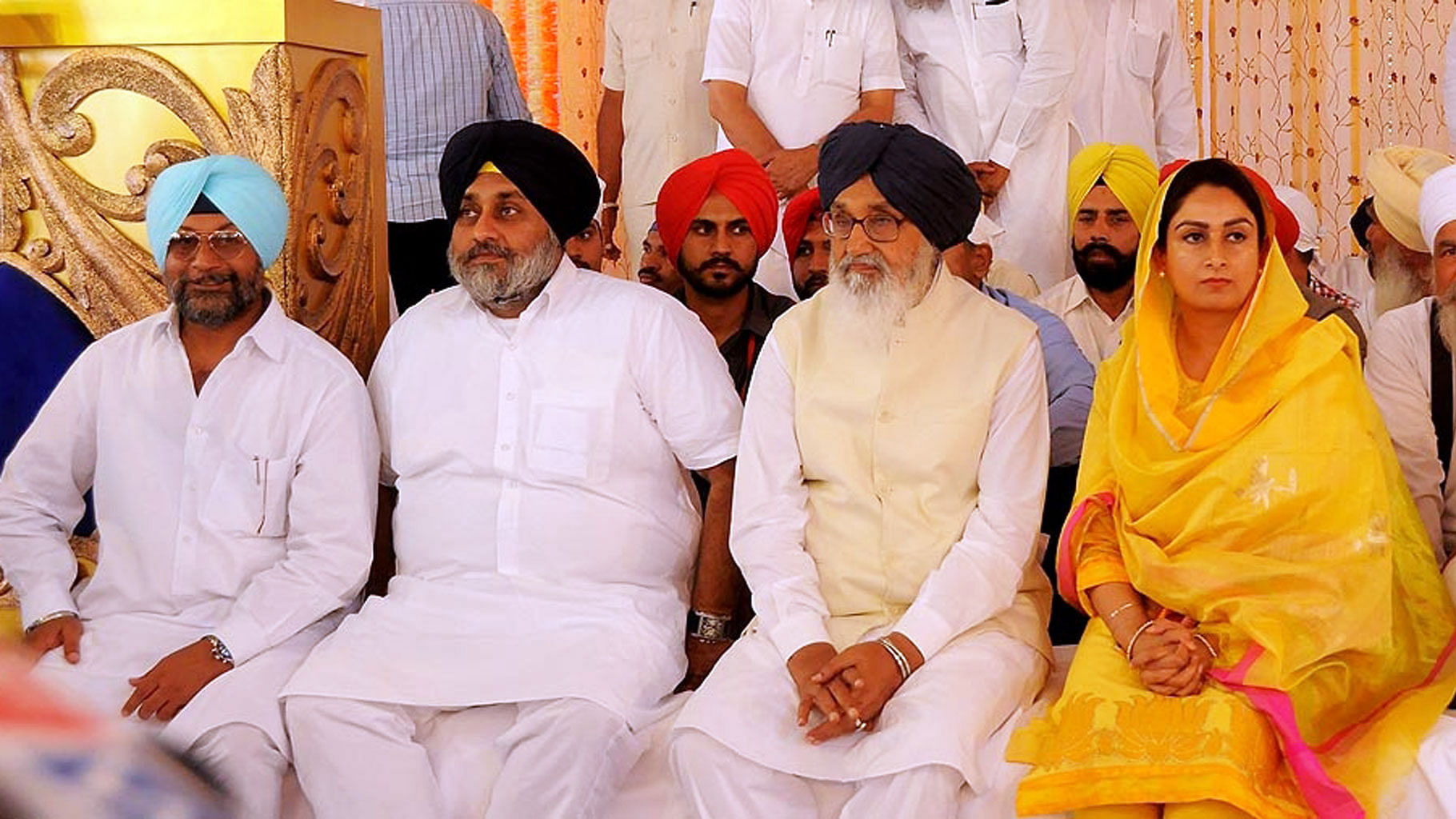Former Punjab Chief Minister Parkash Singh Badal (second from right), ex-Deputy CM Sukhbir Singh Badal (third from right) and Union Minister of Food Processing Harsimrat Kaur Badal (right) during a programme in Punjab.&nbsp;