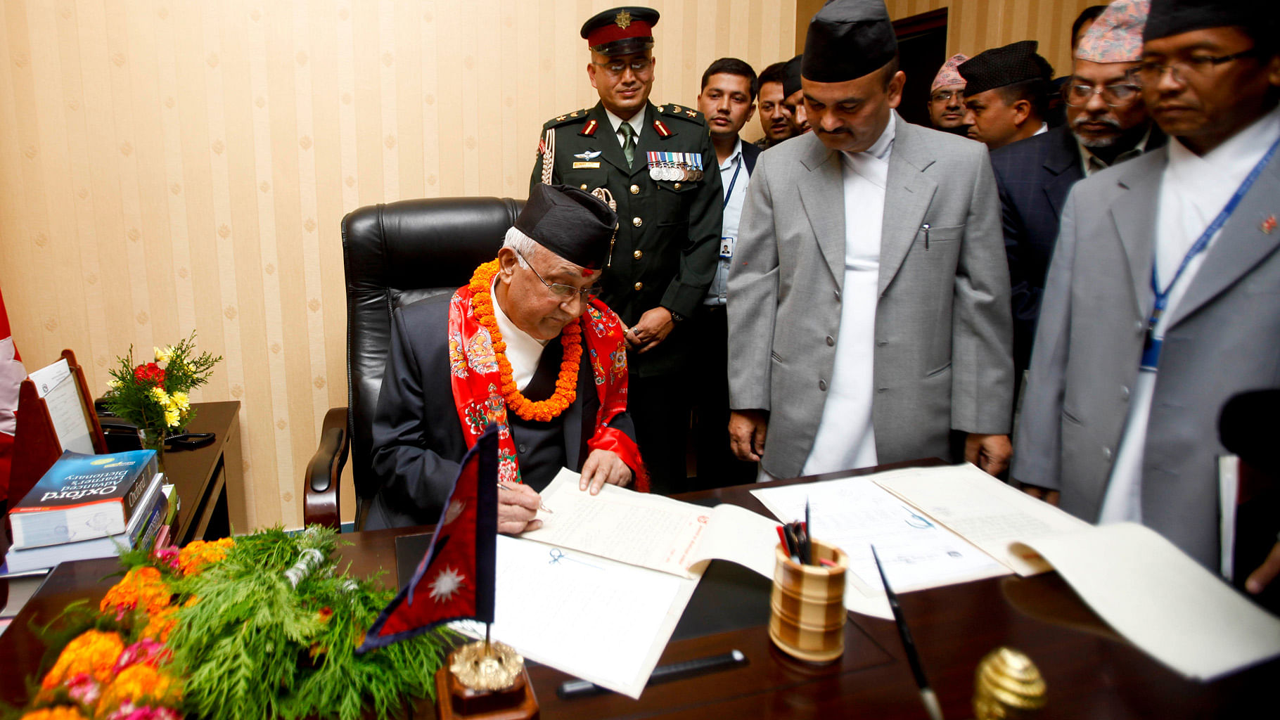 Nepal’s Prime Minister Khadga Prashad Oli  assumes his post at his office in Kathmandu October 2015. (Photo: IANS)