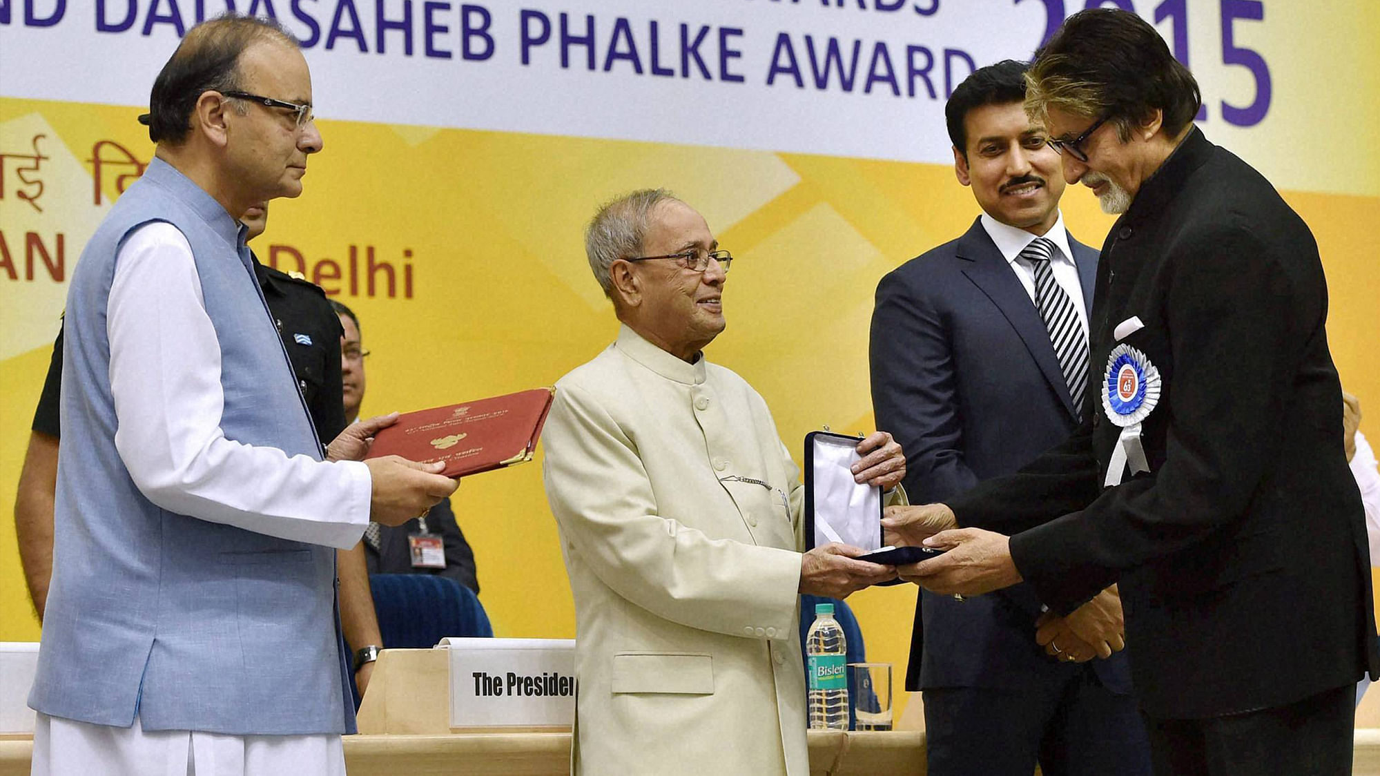 President Pranab Mukherjee presents Best Actor award to Amitabh Bachchan at the 63rd National Film Awards 2015 function in New Delhi on Tuesday.