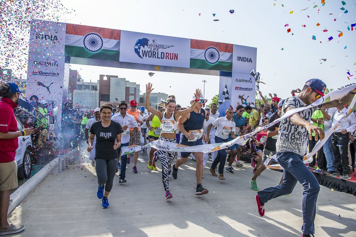 Badminton player - Ashwini Ponnappa, Goalkeeper - Subrata Paul and other stars take part in Wings For Life World Run.