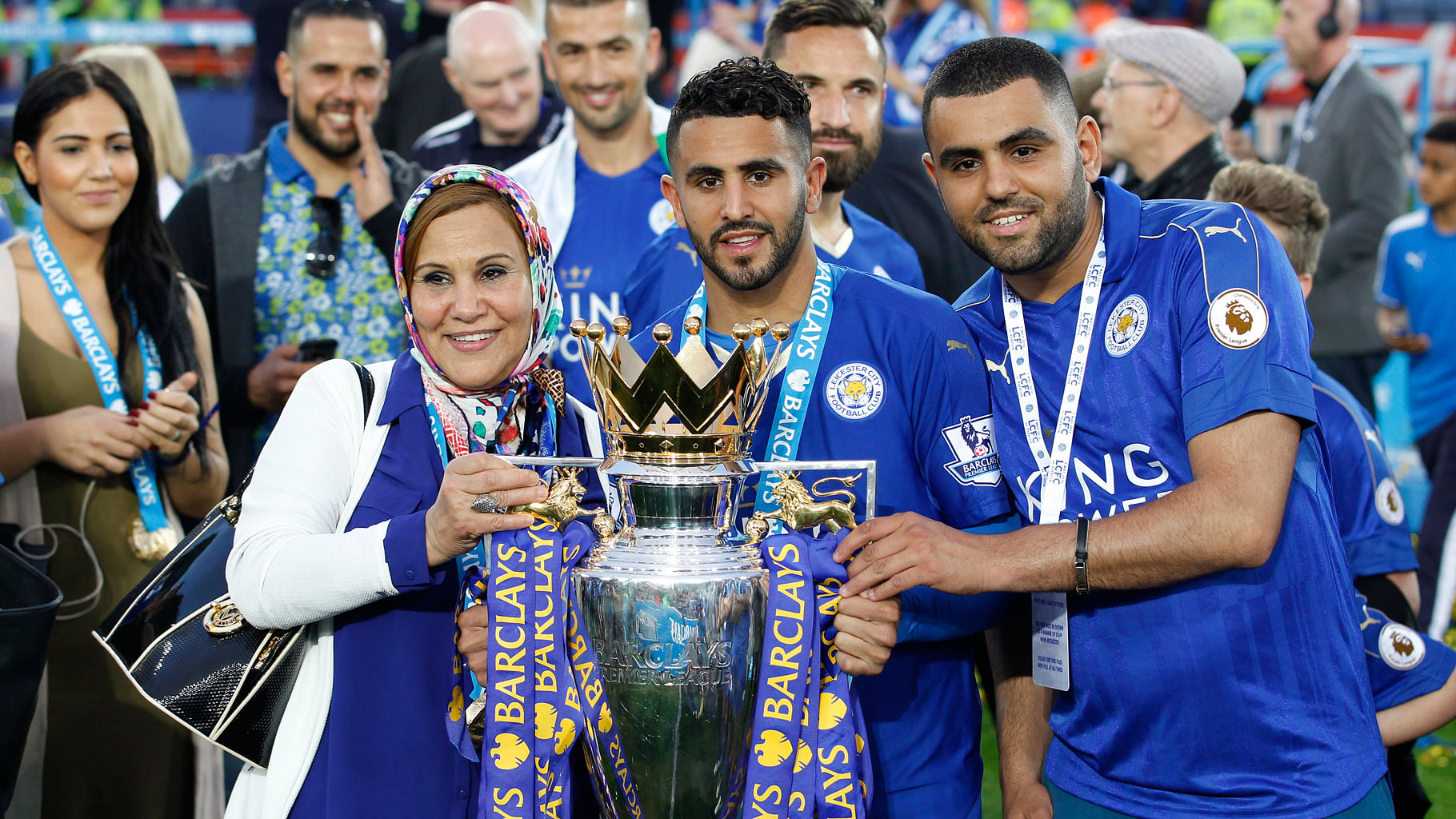 Leicester’s Riyad Mahrez celebrates with the trophy after winning the Barclays Premier League. (Photo: Reuters)&nbsp;