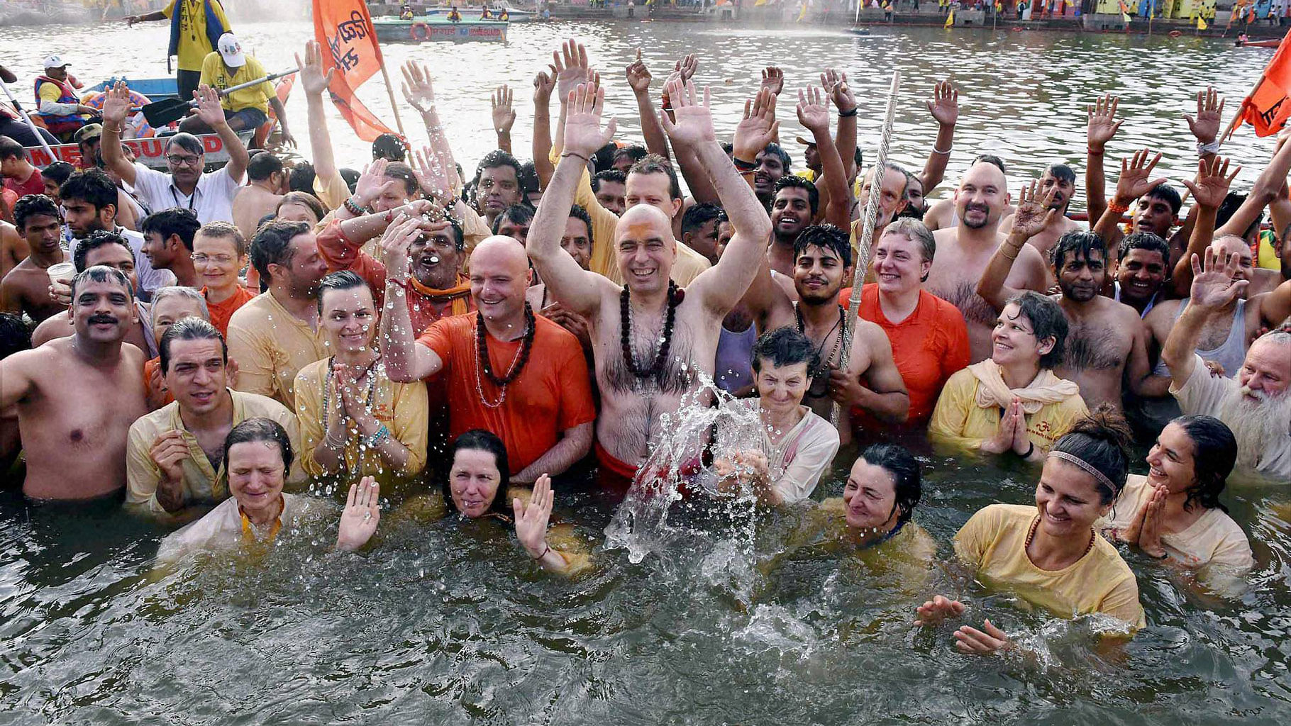 Devotees taking bath during the 3rd Shahi Snan (Royal bath), on the last day of Simhastha Mahakumbh in Ujjain, Madhya Pradesh. (Photo: PTI) 