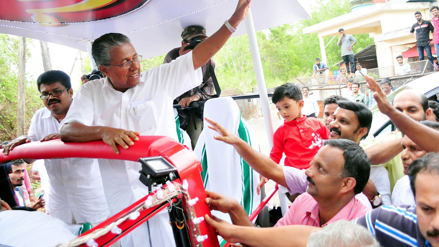 CPI-M leader Pinarayi Vijayan celebrates party’s performance in the recently concluded Kerala Assembly polls in Kannur on 19 May  2016. (Photo: <i>IANS</i>)