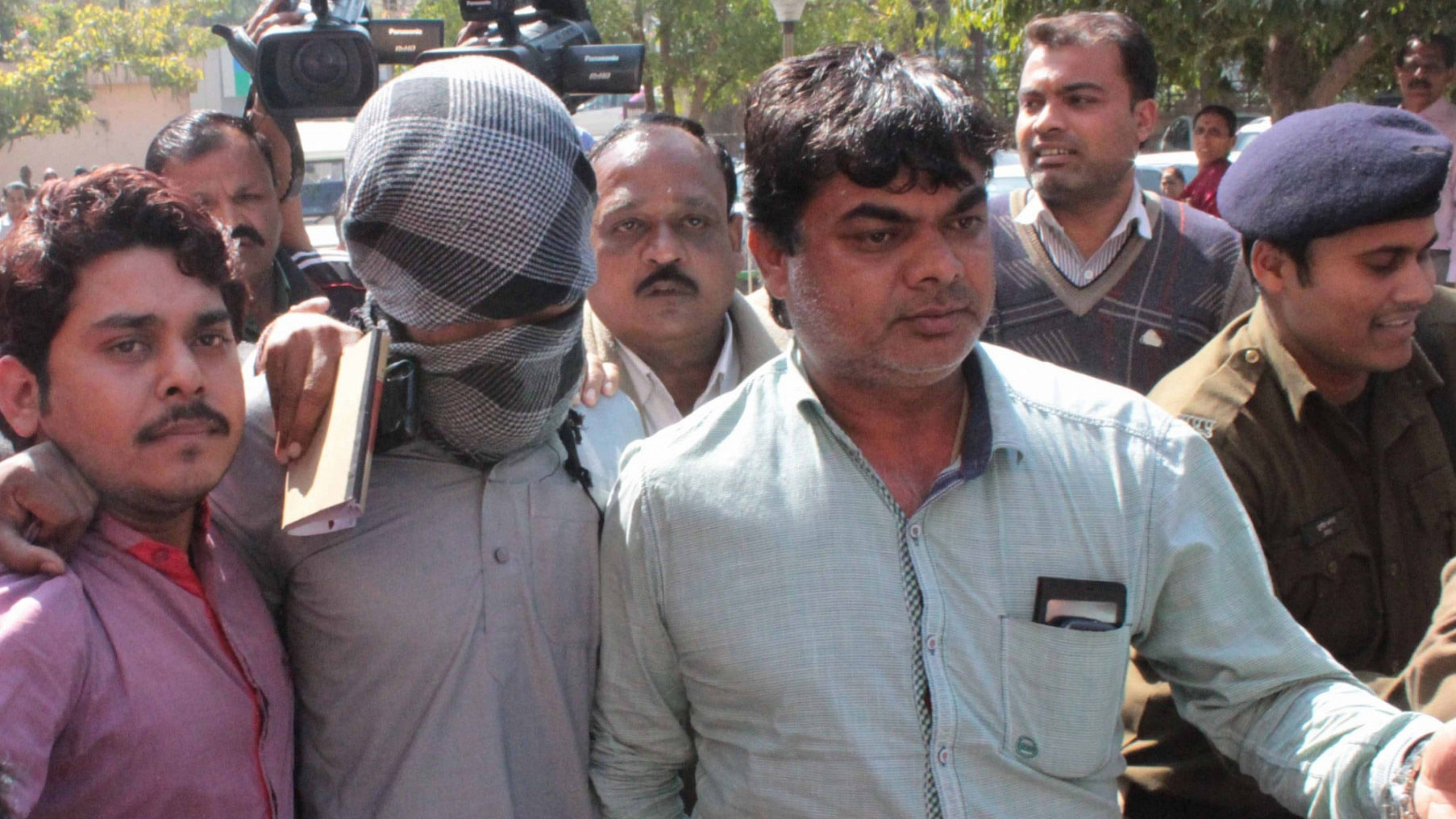 

Azhar Iqbal a terror suspect having alleged links with Islamic State terrorist outfit who were arrested by NIA being produce at a court in Bhopal on Feb 2, 2016. (Photo: IANS)