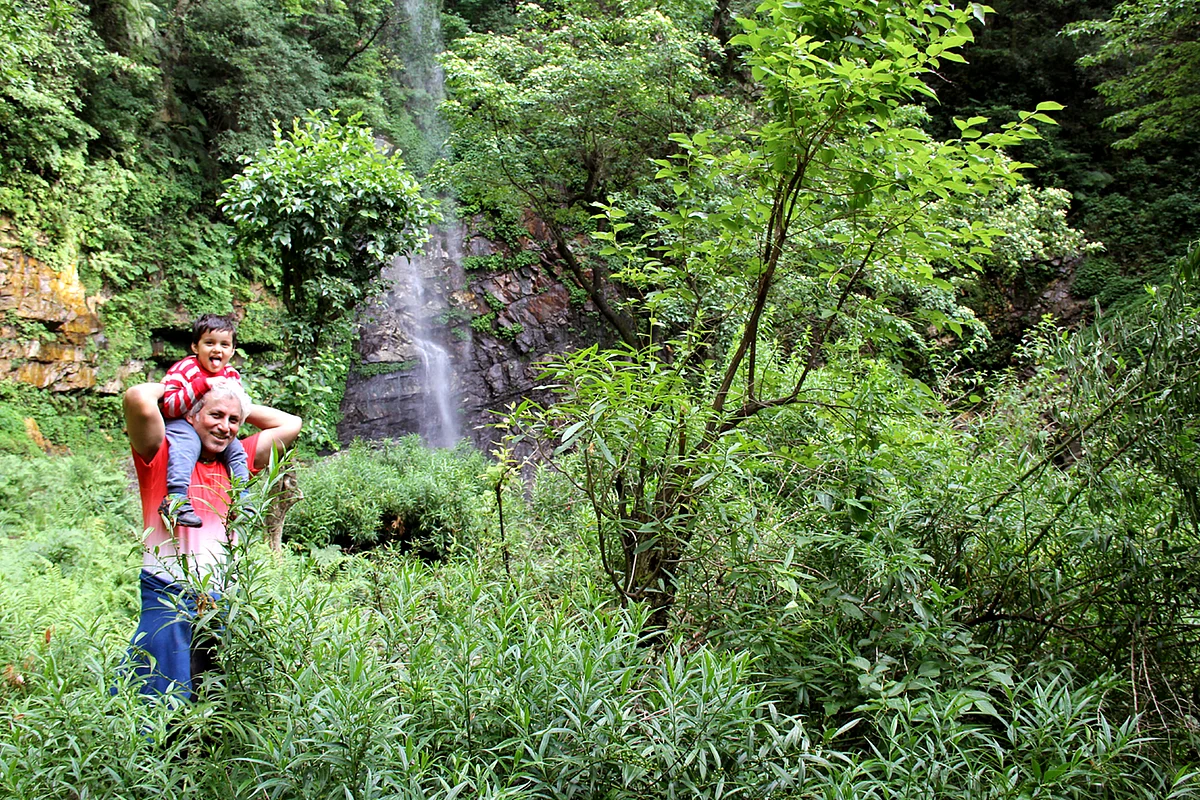Kazuo trekking to the waterfall with dad. (Photo Courtesy: Sahar Zaman) 