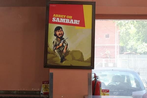 This Bengaluru restaurant combines popular movie dialogues with names of dishes, to make quirky  posters.