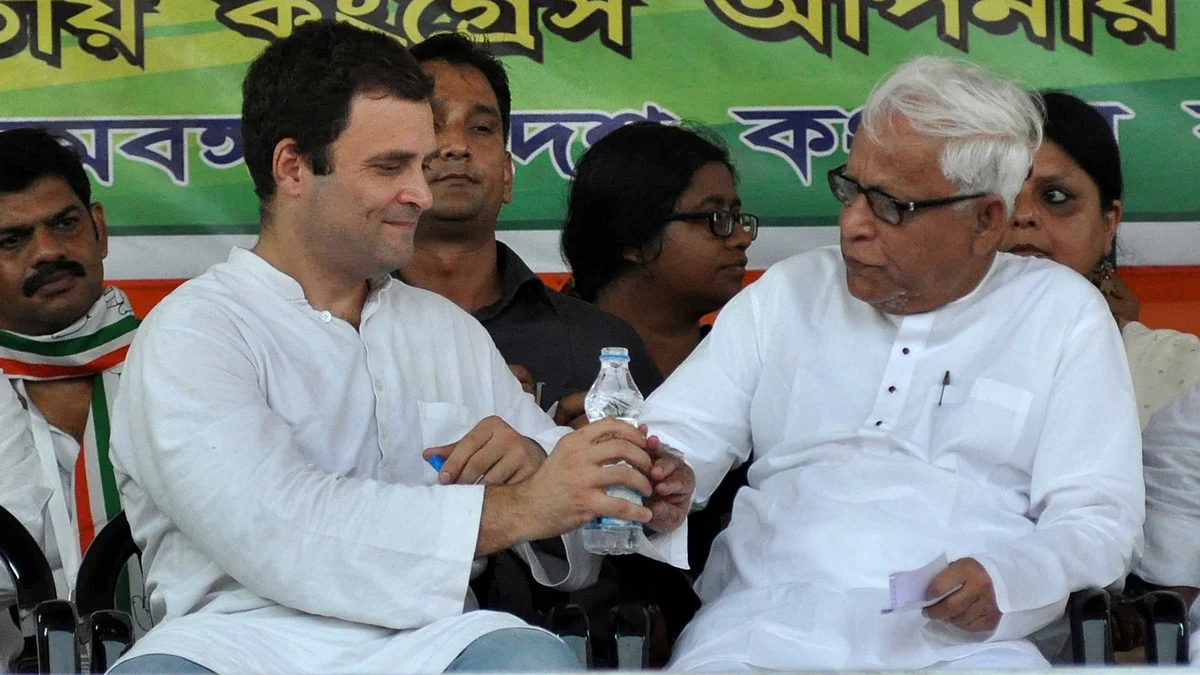 Congress Vice-President Rahul Gandhi and former West Bengal Chief Minister Buddhadeb Bhattacharya during a Congress-CPI(M) rally in Kolkata on April 27, 2016. (Photo: Kuntal Chakrabarty/IANS)