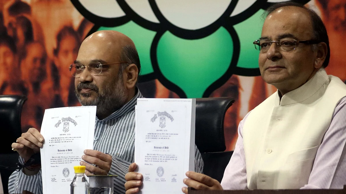 Union Minister Arun Jaitley and BJP chief Amit Shah during a press conference on Prime Minister Narendra Modi’s educational qualifications in New Delhi, on May 9, 2016. (Photo: IANS)