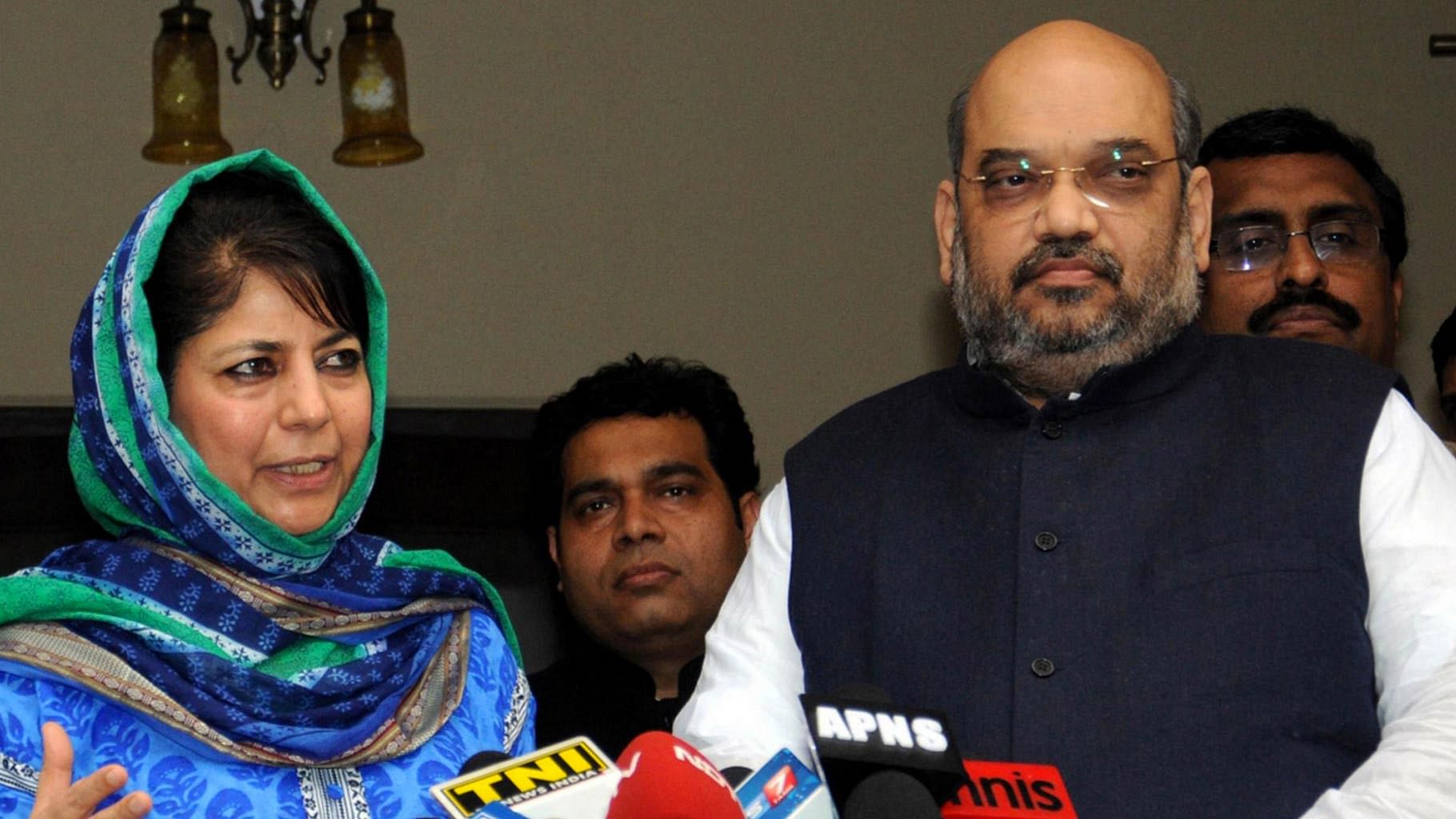 File photo of PDP chief Mehbooba Mufti and BJP chief Amit Shah and General Secretary Ram Madhav.&nbsp;
