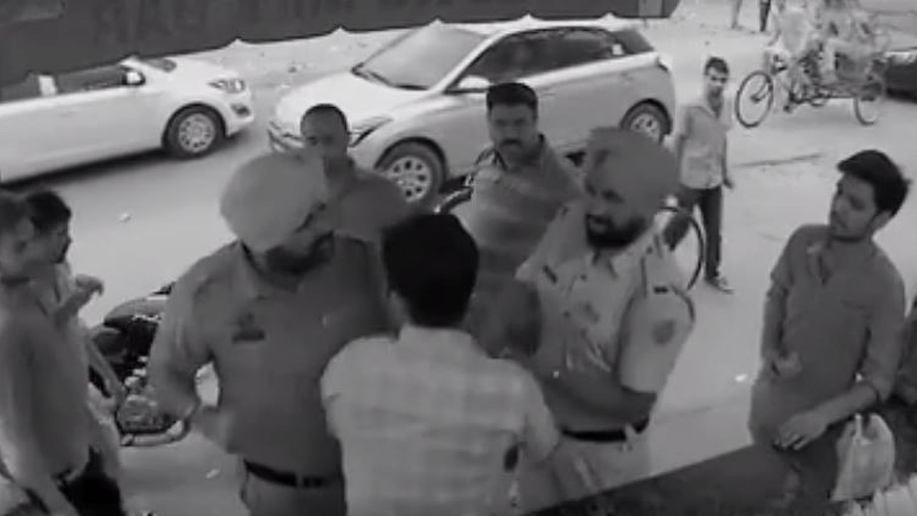 Video grab of the CCTV footage showing the youth being thrashed  by Punjab police personnel. 