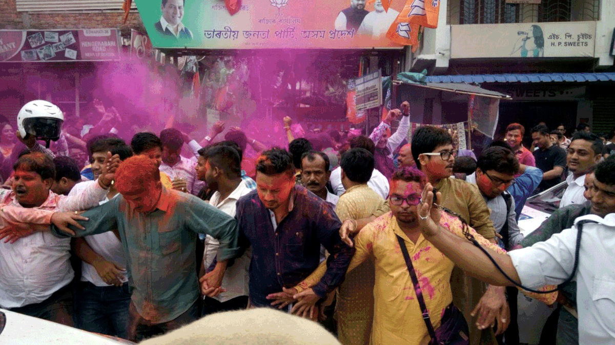  Supporters of the winning parties burst into color and dance as results of the polls were declared.