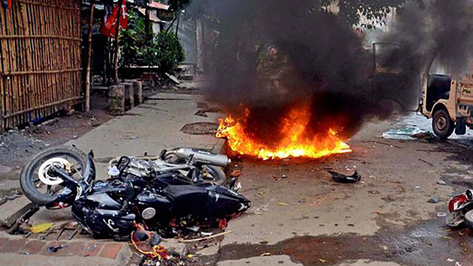 

Motorcycles in flames after clashes during 2015 municipal elections in Saltlake. (Photo: PTI) &nbsp;     