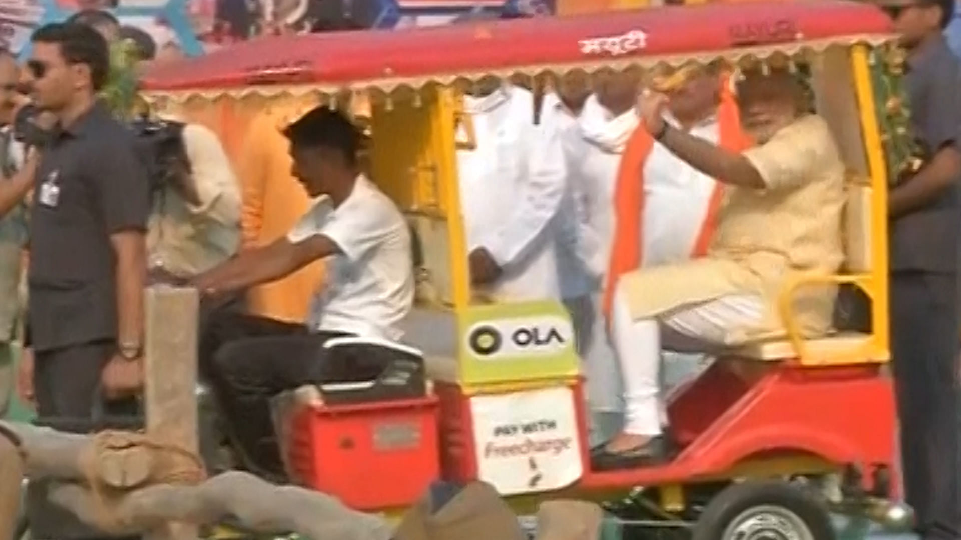

At the Diesel Locomotive Works (DLW) premises, Modi took an e-rickshaw ride. (Photo: ANI screengrab)
