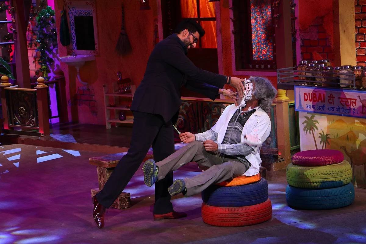 Abhishek smashing a cake on Sunil’s face during the show. (Photo courtesy: Sony)