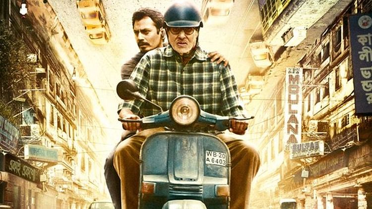Amitabh Bachchan as John Biswas, riding a blue scooter on the streets of Kolkata in <i>TE3N</i>