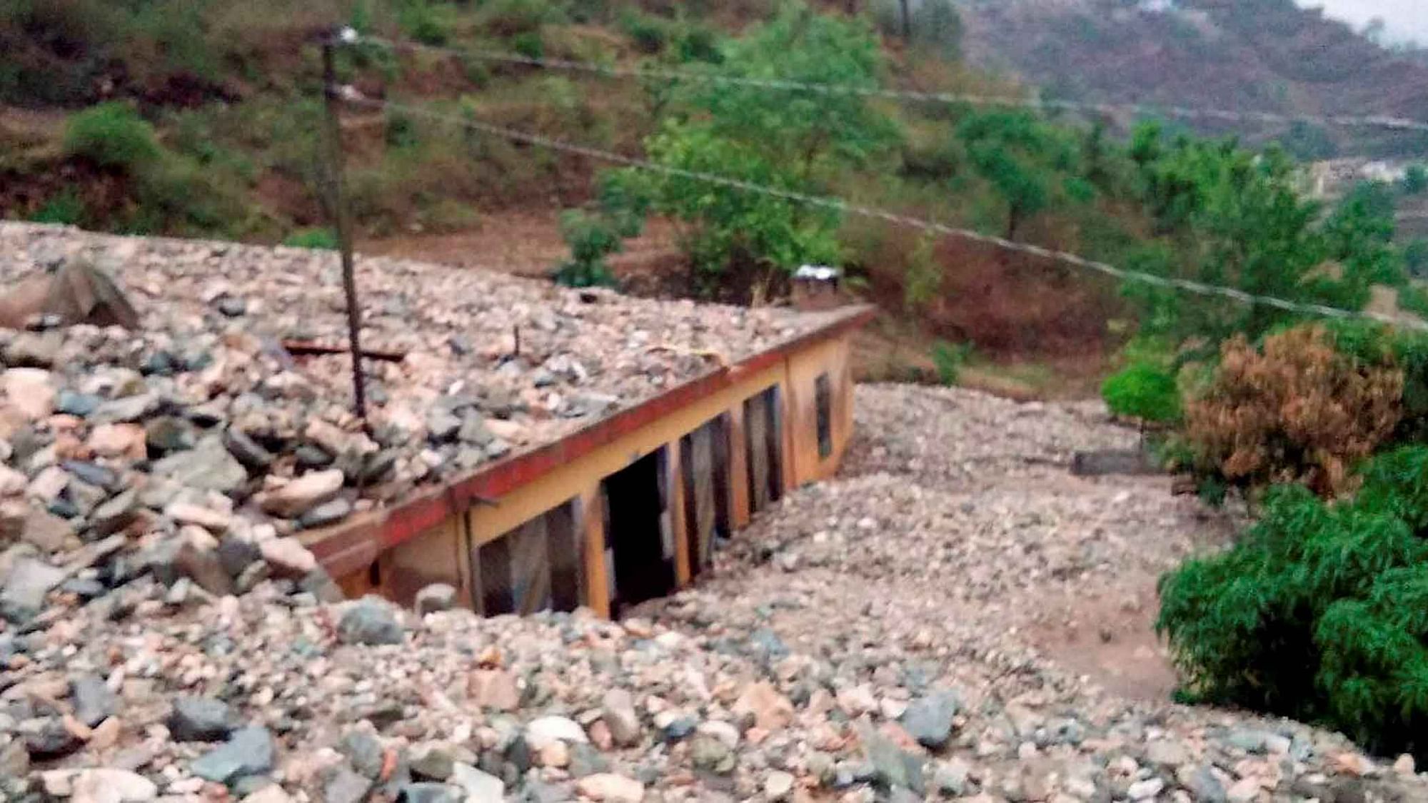 A still of the havoc caused by a landslide in Tehri District. (Photo: PTI)