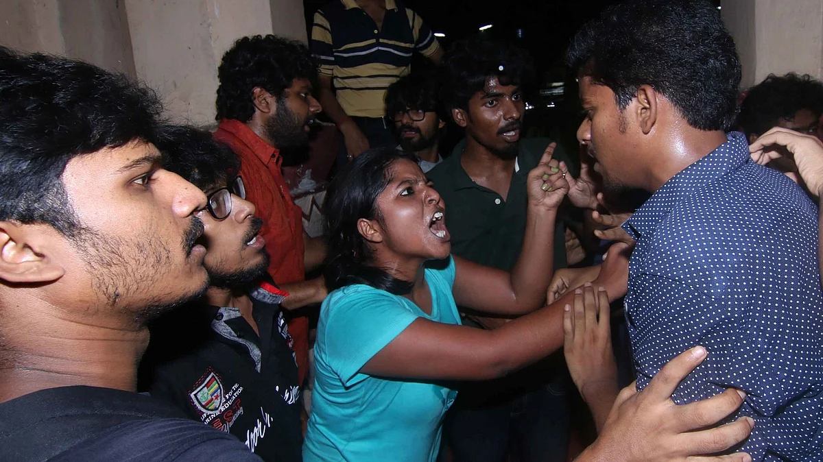 Left and ABVP students clash with each other during the screening of the film <i>“Buddha In A Traffic Jam”</i> at Jadavpur University campus in Kolkata on 6 May 2016. (Photo: IANS)