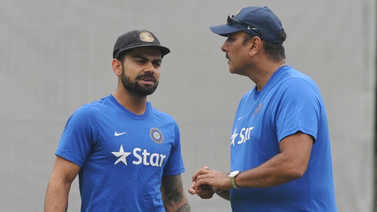 Virat Kohli (L) and Ravi Shastri (R). (Photo: IANS)