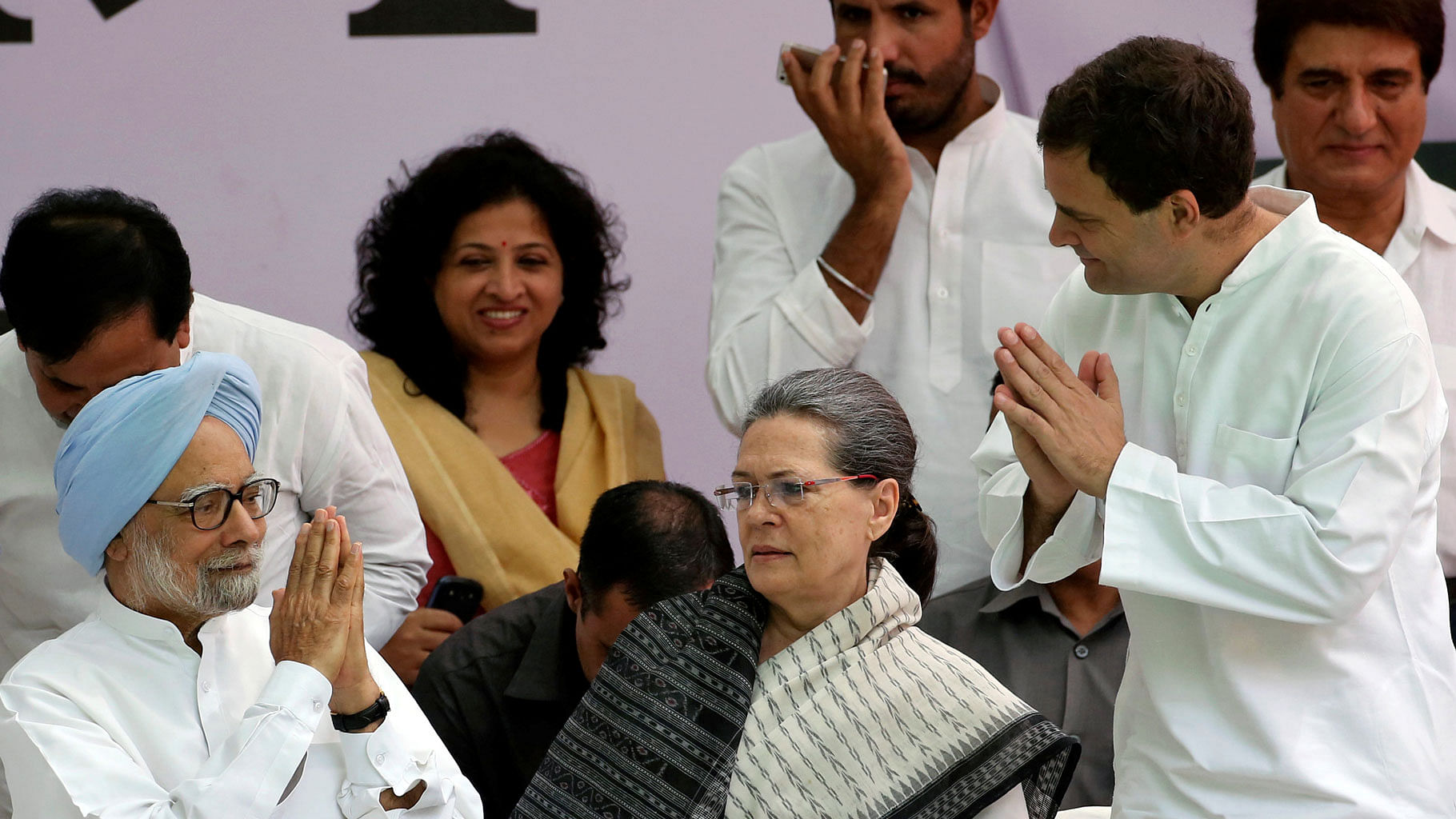 Former prime minister Manmohan Singh (L) is greeted by Congress party’s vice-president Rahul Gandhi as the party’s President Sonia Gandhi (C) looks on before what the party calls “Save Democracy” march to parliament in New Delhi on May 6, 2016. (Photo: Reuters)