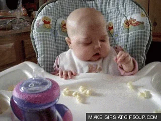 (GIF Courtesy: <a href="http://stream1.gifsoup.com/view/962833/baby-eating-popcorn-o.gif">gifsoup.com</a>)