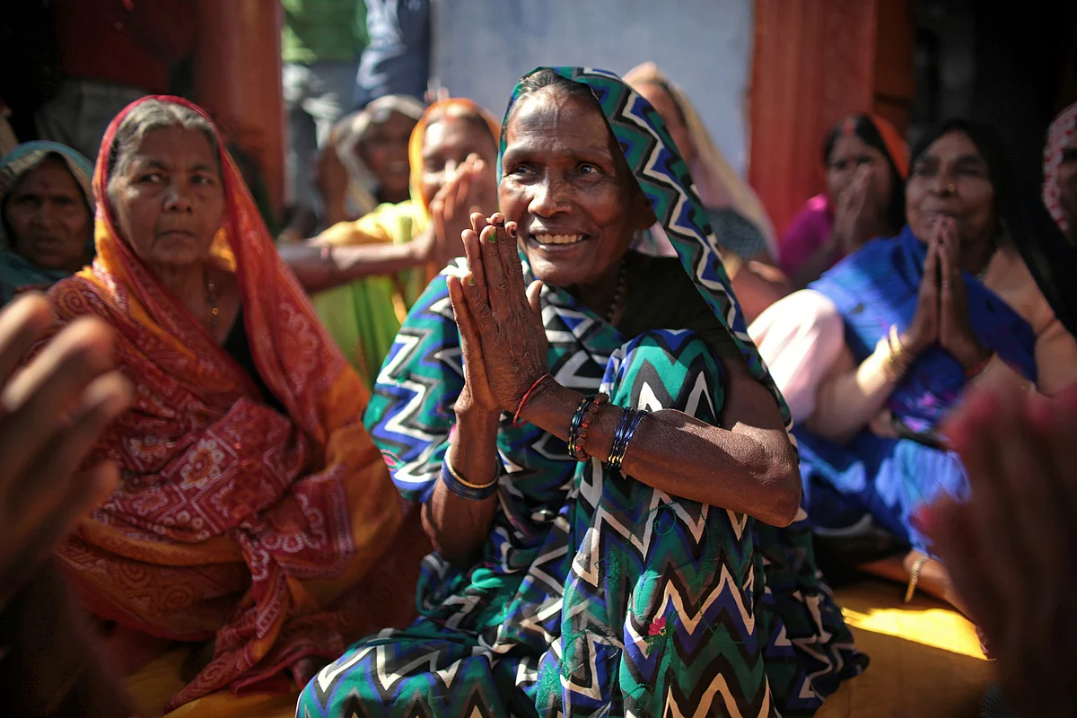 Every Monday in the village of Joni, Sasarem, Bihar, female devotees who have dedicated themselves to the God Shiva perform songs at a local temple. (Photo: Souvid Datta)